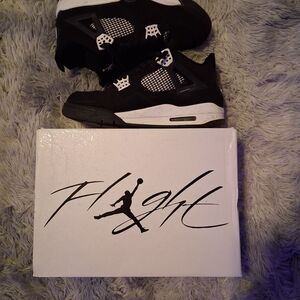 Jordan 4 Retro Sneakers in Black and White